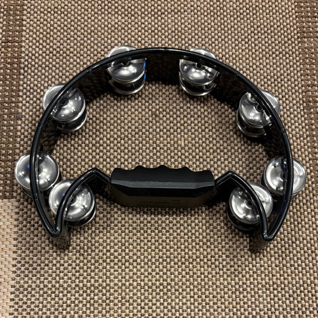 Mano percussion tambourine - used/usagée